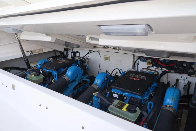 Slide: The Image of Engine compartment of 2009 Tiara Yachts 32 Open, featuring dual Crusader engines. - 23
