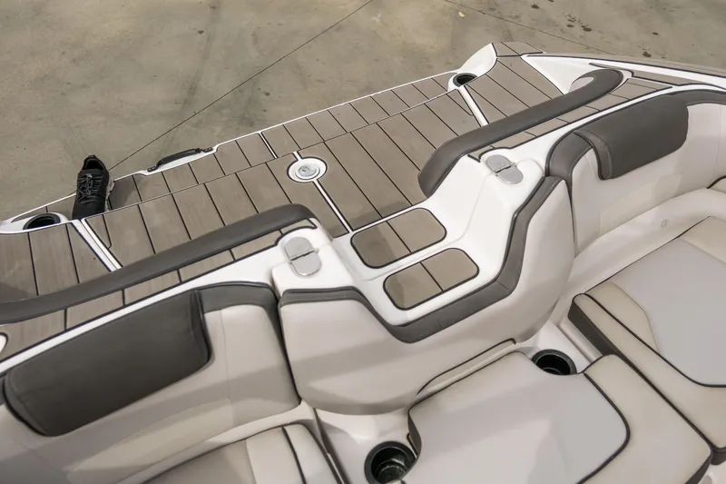 Slide: The Image of 2019 Yamaha Boats AR 190 swim platform with cushioned seating and sleek design. - 10