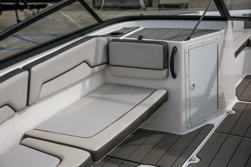 Slide: The Image of 2019 Yamaha Boats AR 190 interior with cushioned seating and sleek design. - 4
