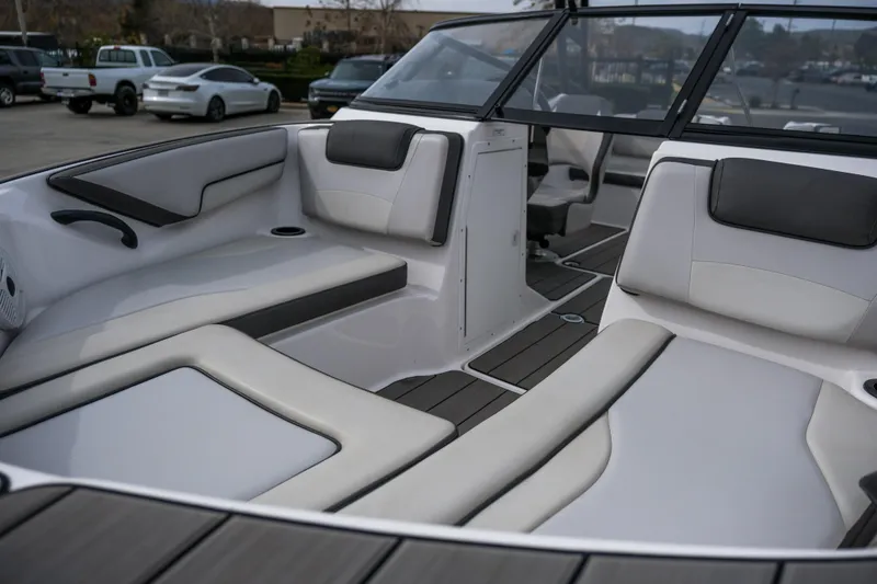Slide: The Image of 2019 Yamaha Boats AR 190 interior with sleek seating and modern design. - 7