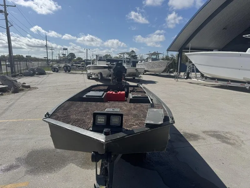 Slide: The Image of 2018 Go-Devil 18 boat on trailer in sunny outdoor setting. - 11