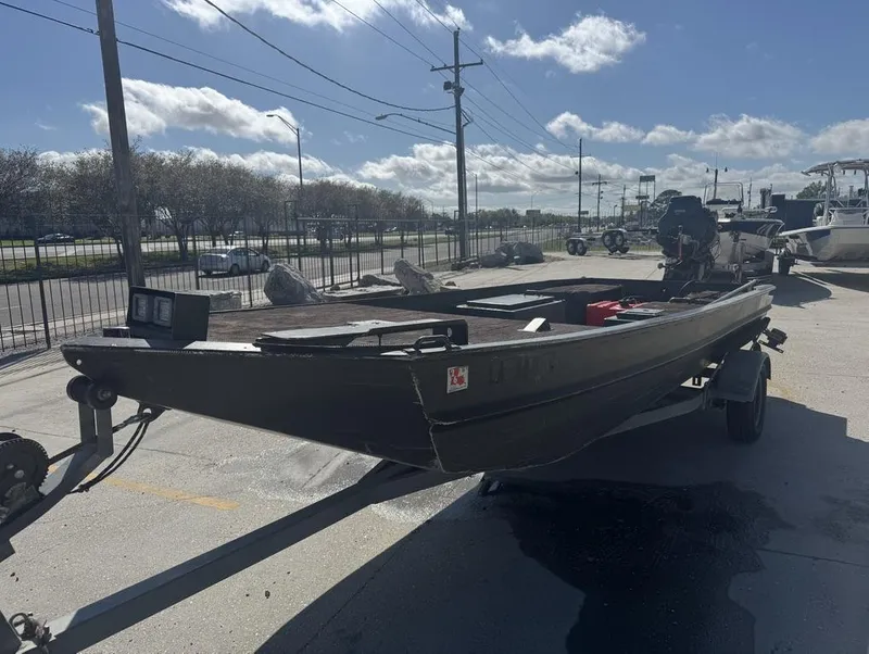 Slide: The Image of 2018 Go-Devil 18 boat on trailer under clear sky. - 3
