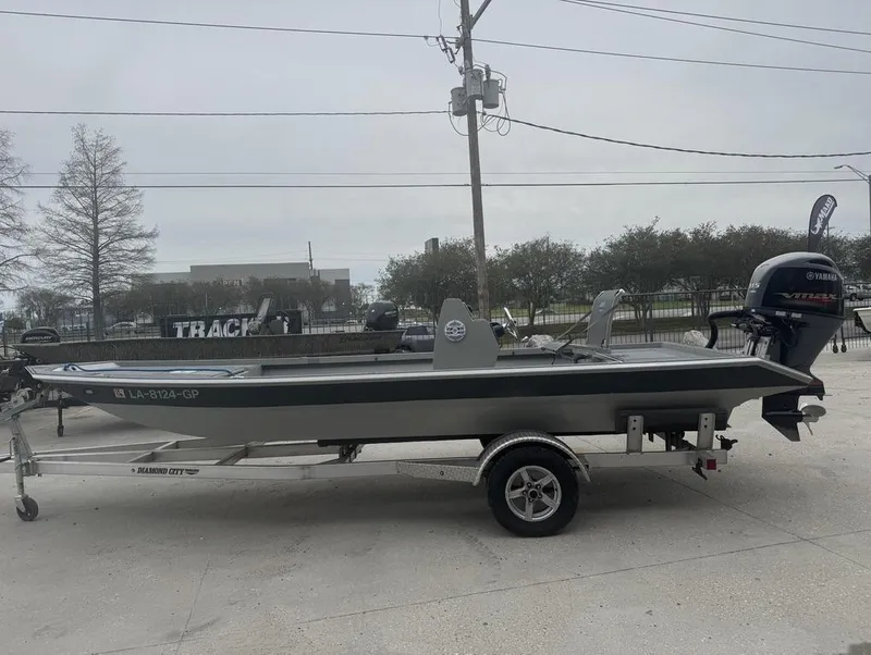 Slide: The Image of 2023 Rene Gros Custom 20 boat on trailer, Yamaha outboard motor, outdoor setting. - 10