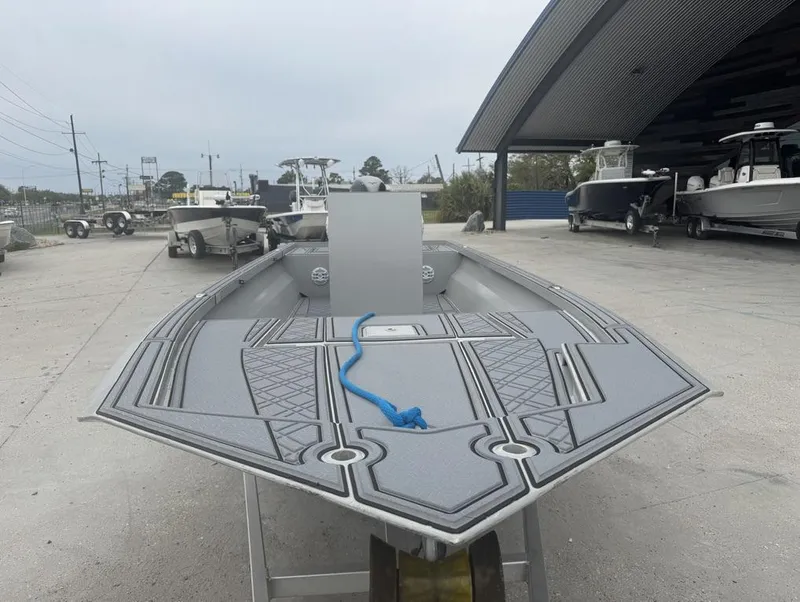 Slide: The Image of 2023 Rene Gros Custom 20 boat with sleek design, displayed outdoors. - 3