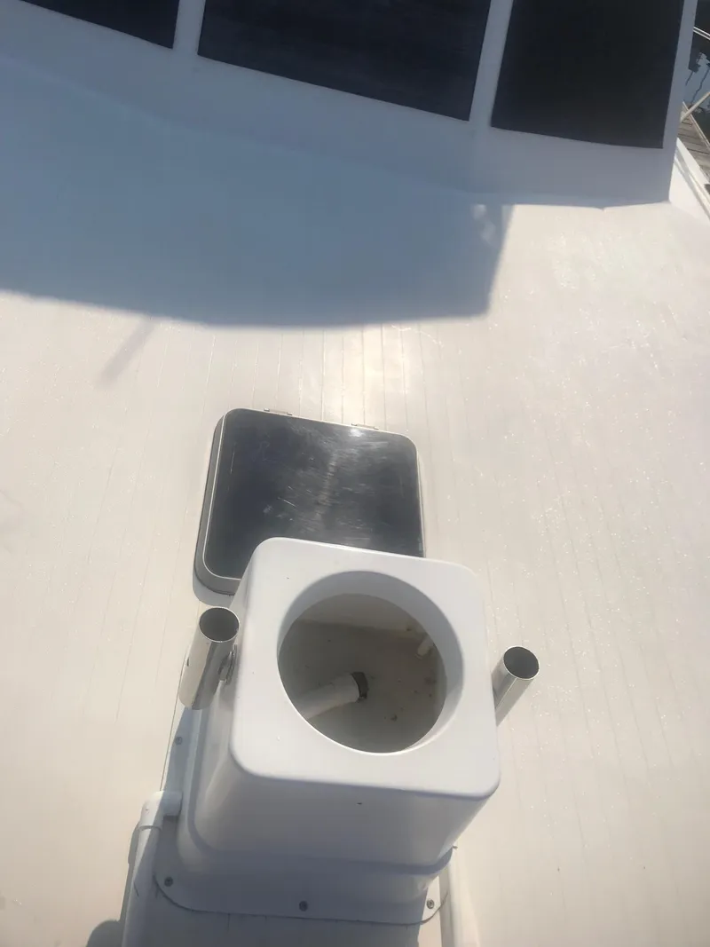 Slide: The Image of 1988 Jersey 40FT Convertible boat deck with hatch and fittings. - 5