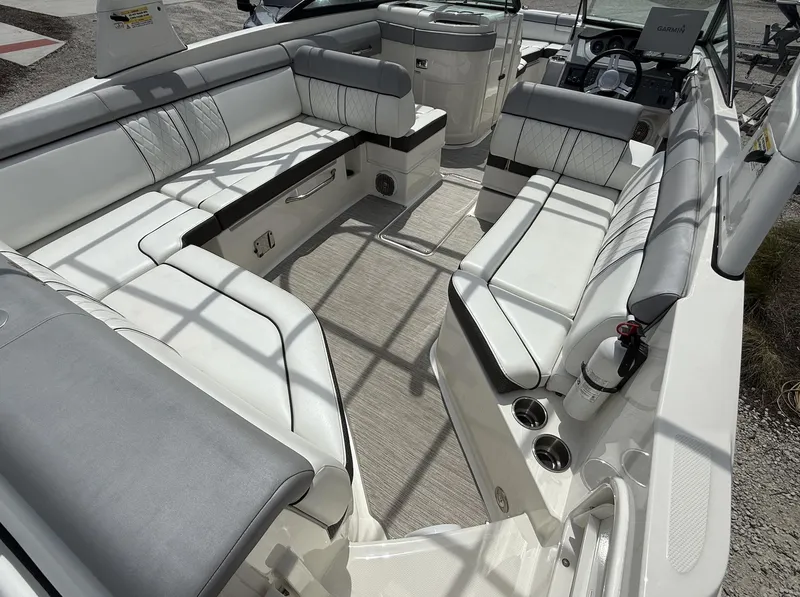 Slide: The Image of 2017 Sea Ray SDX 270 Outboard boat interior with spacious seating and modern design. - 12