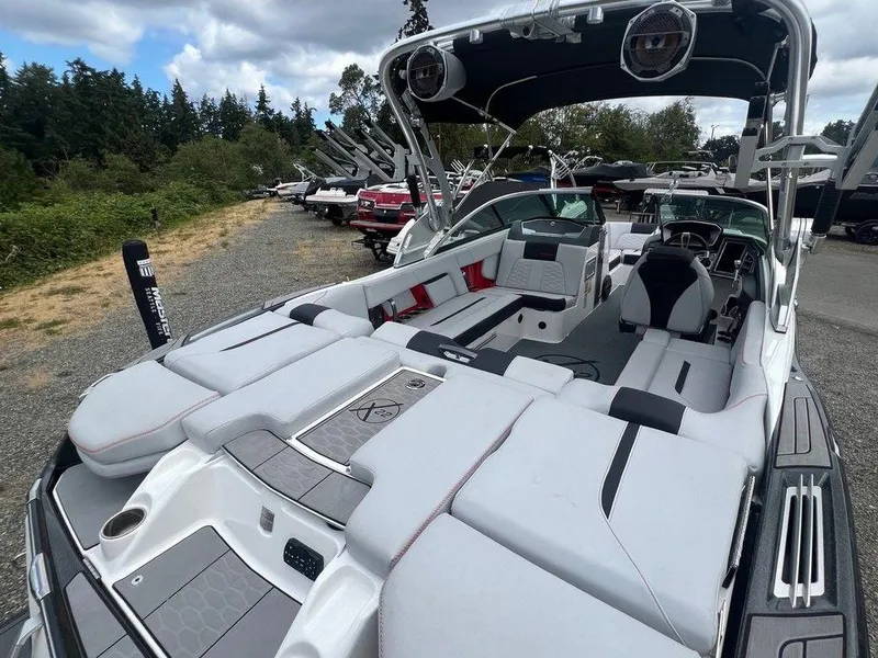 Slide: The Image of 2019 MasterCraft X22 boat with spacious seating and modern design. - 4