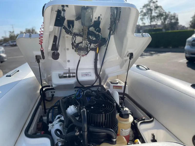 Slide: The Image of 2011 Williams Jet Tenders 325 Turbo Jet engine compartment with open hood. - 10