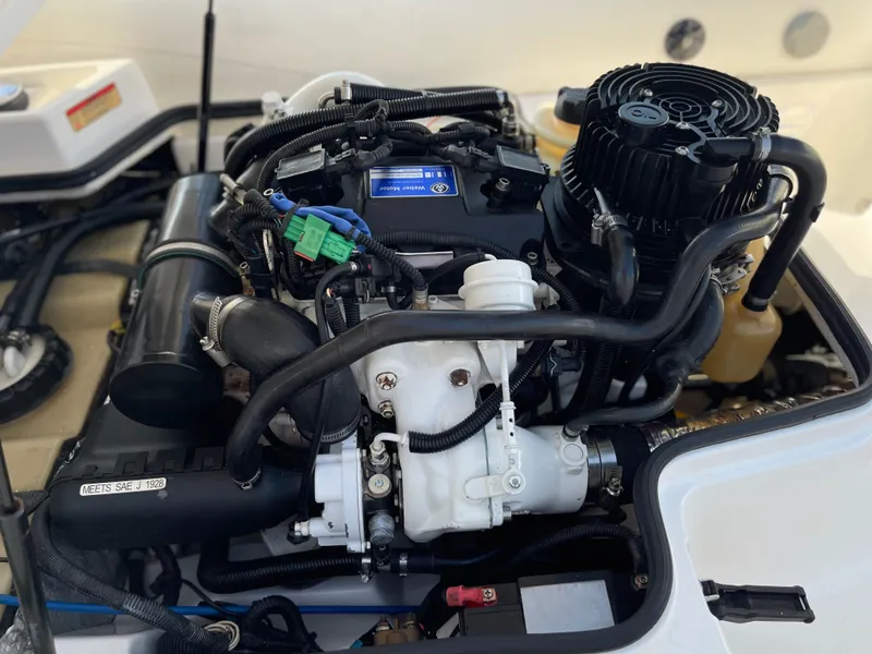 Slide: The Image of Engine of 2011 Williams Jet Tenders 325 Turbo Jet, showcasing intricate components and wiring. - 12