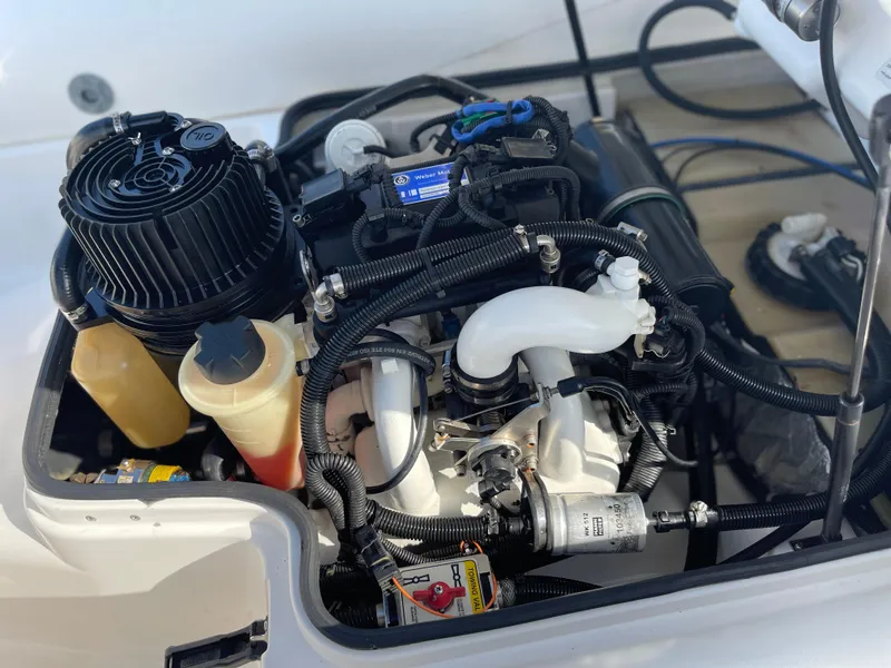 Slide: The Image of Engine of 2011 Williams Jet Tenders 325 Turbo Jet, showcasing intricate components and wiring. - 13