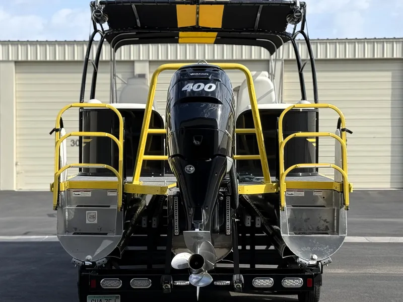 Slide: The Image of 2021 PlayCraft Infinity 2900 boat with powerful 400 HP engine, docked at marina. - 10