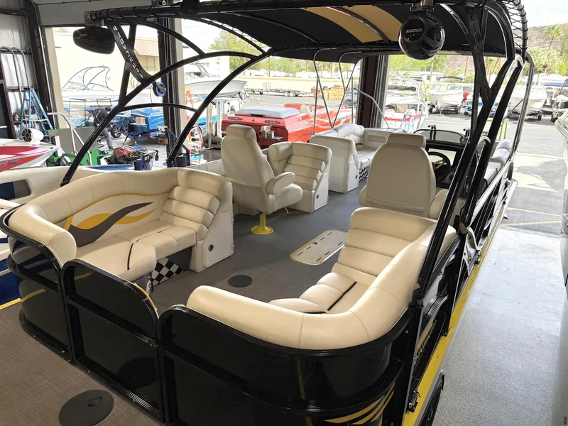 Slide: The Image of 2021 PlayCraft Infinity 2900 boat interior with luxurious seating and modern design. - 26