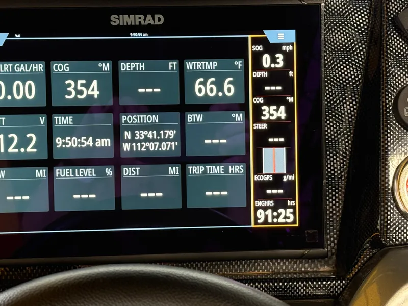 Slide: The Image of Simrad display on 2021 PlayCraft Infinity 2900 showing navigation and engine data. - 35