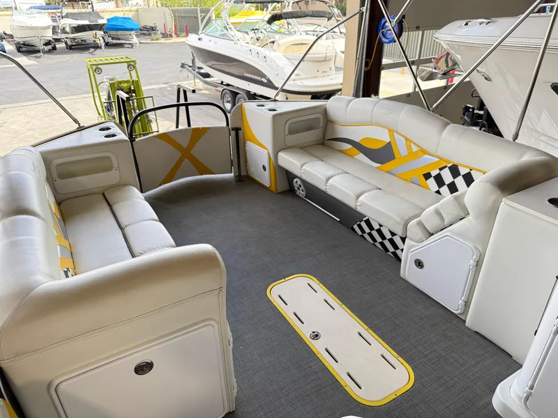 Slide: The Image of 2021 PlayCraft Infinity 2900 boat interior with stylish seating and modern design. - 39