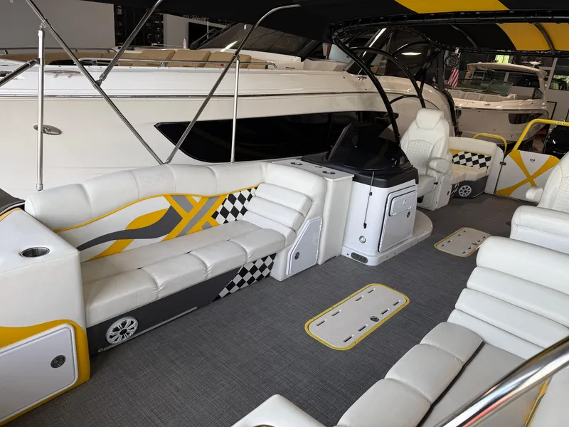 Slide: The Image of 2021 PlayCraft Infinity 2900 boat interior with stylish seating and modern design elements. - 43