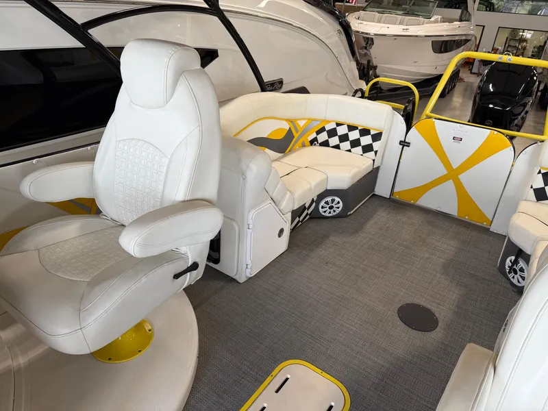 Slide: The Image of Interior of 2021 PlayCraft Infinity 2900 boat with white and yellow seating. - 46
