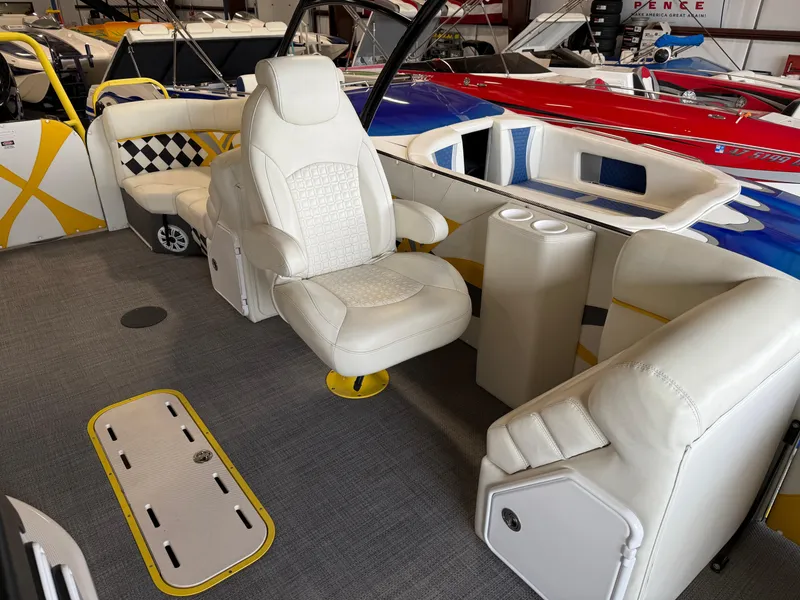 Slide: The Image of 2021 PlayCraft Infinity 2900 boat interior with white seating and modern design. - 47