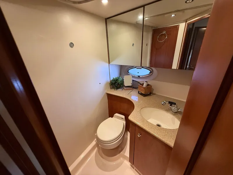 Slide: The Image of Luxurious bathroom in 2007 Silverton 36 Convertible yacht with modern fixtures and elegant design. - 28