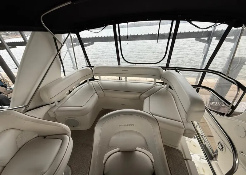 Slide: The Image of 2007 Silverton 36 Convertible boat interior with plush seating and panoramic windows. - 34