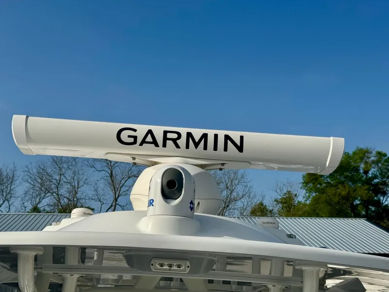 Slide: The Image of Garmin radar on 2022 Yellowfin 36 Open boat against clear blue sky. - 19