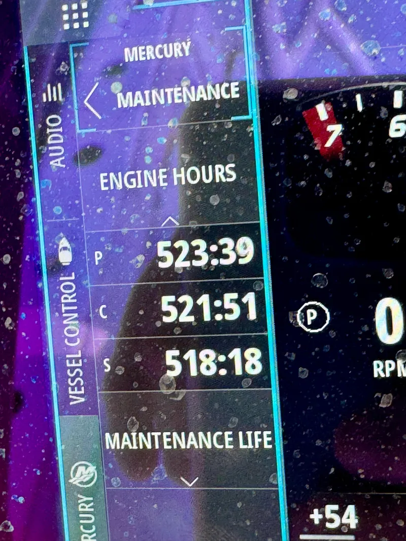 Slide: The Image of Yellowfin 36 Open 2022 boat dashboard showing engine hours and maintenance details. - 20