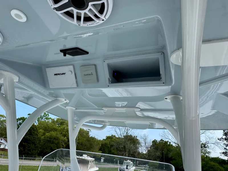 Slide: The Image of 2022 Yellowfin 36 Open boat console with speaker and electronic controls. - 7
