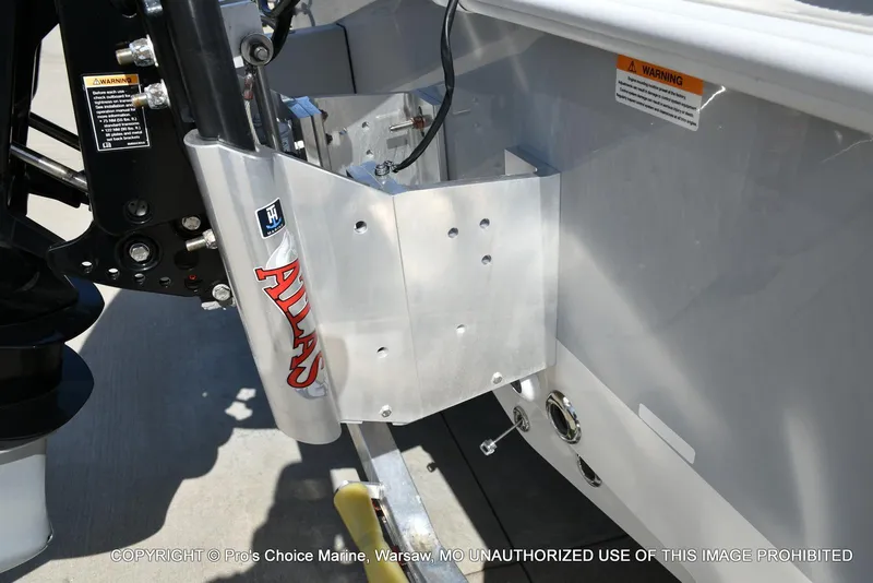 Slide: The Image of 2023 Ranger 2360 Bay boat with Atlas jack plate and warning labels. - 15