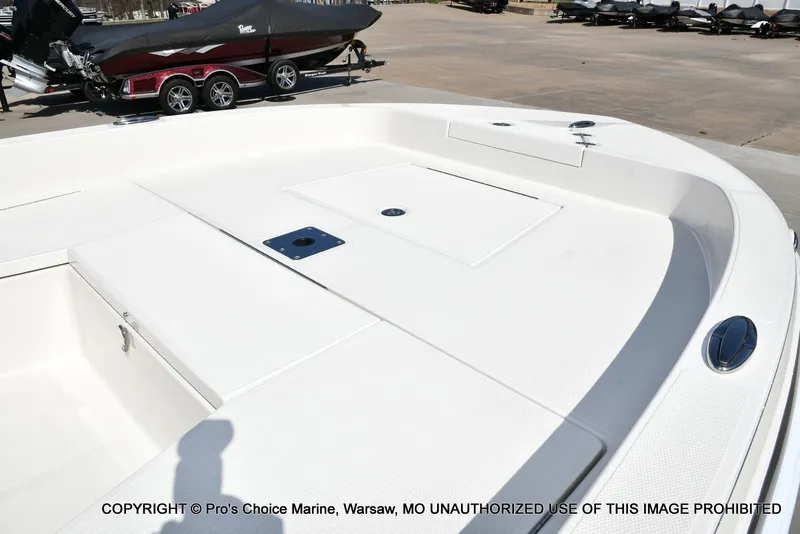 Slide: The Image of 2023 Ranger 2360 Bay boat deck, featuring spacious storage and sleek design. - 23