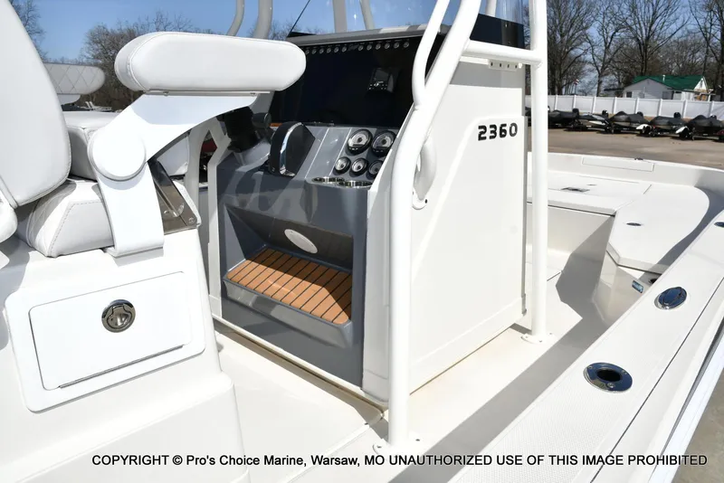 Slide: The Image of 2023 Ranger 2360 Bay boat interior with console and seating. - 25