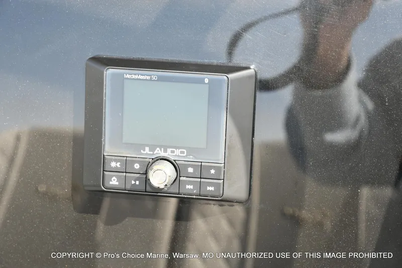 Slide: The Image of JL Audio MediaMaster 50 installed on 2023 Ranger 2360 Bay boat dashboard. - 33