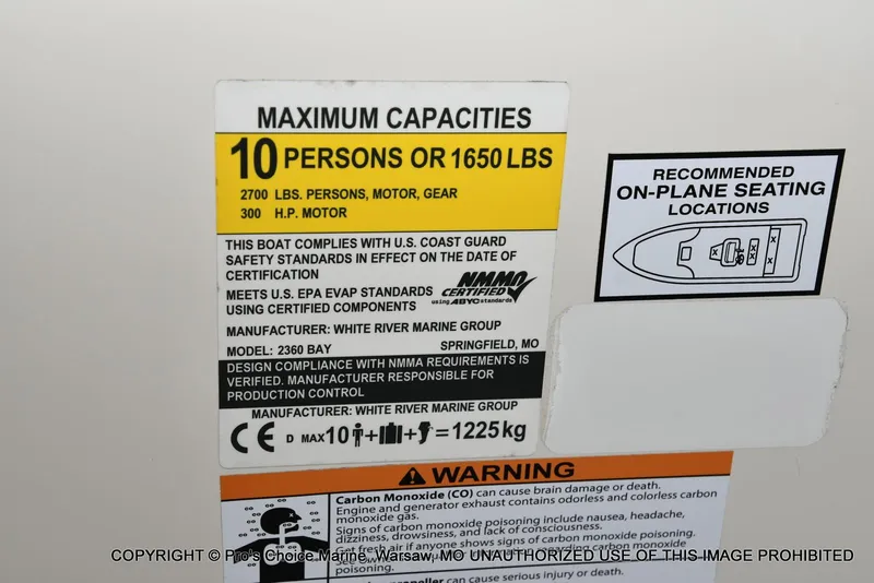 Slide: The Image of 2023 Ranger 2360 Bay boat capacity label, 10 persons or 1650 lbs, safety compliance details. - 42