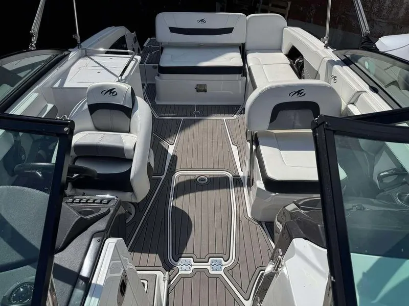 Slide: The Image of 2015 Monterey 258SS boat interior with sleek seating and modern design. - 5