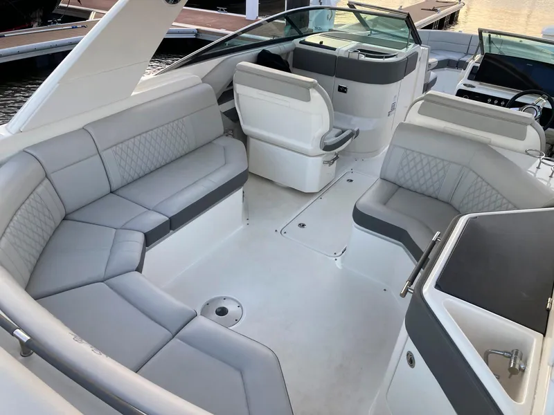 Slide: The Image of 2021 Sea Ray SLX 310 OB boat interior with luxurious seating and modern design. - 33