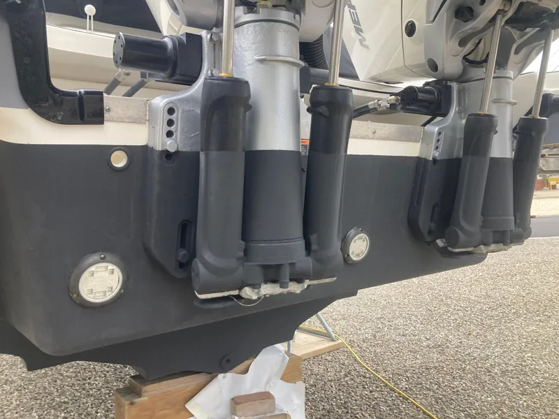 Slide: The Image of 2021 Sea Ray SLX 310 OB outboard motors, close-up view. - 41