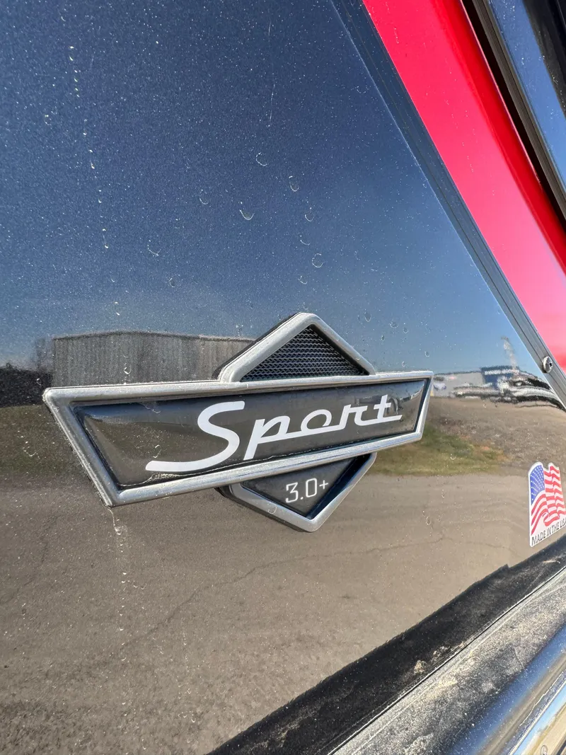 Slide: The Image of Close-up of 2023 South Bay 25 Sport RS9 DC emblem with 'Sport 3.0+' badge. - 11