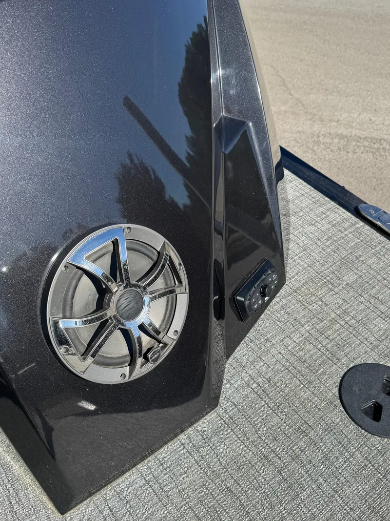 Slide: The Image of 2023 South Bay 25 Sport RS9 DC boat speaker and control panel on deck. - 19