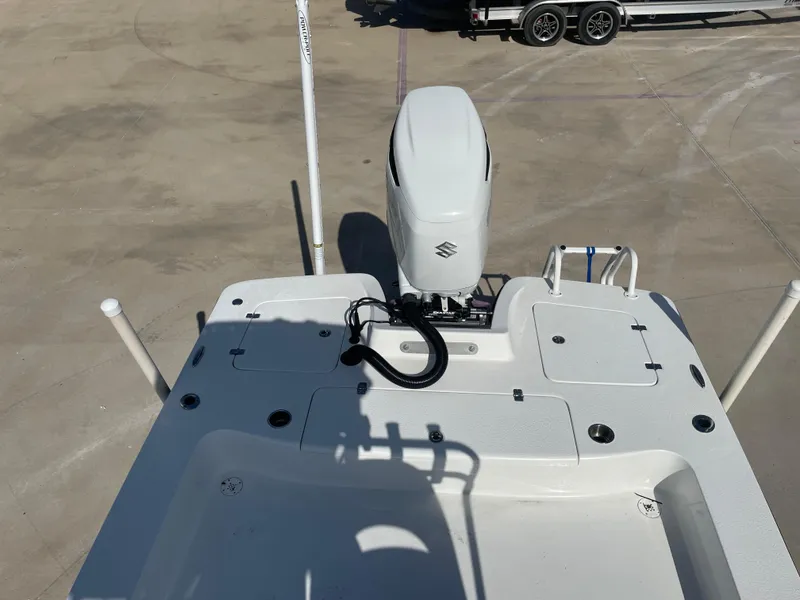 Slide: The Image of Catalyst 2550 CAT 2022 boat with Suzuki outboard motor, viewed from above. - 7