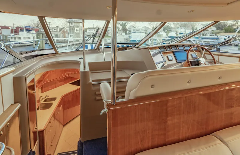 Slide: The Image of Interior of 2000 Neptunus 54 Express yacht with helm and kitchen area. - 15