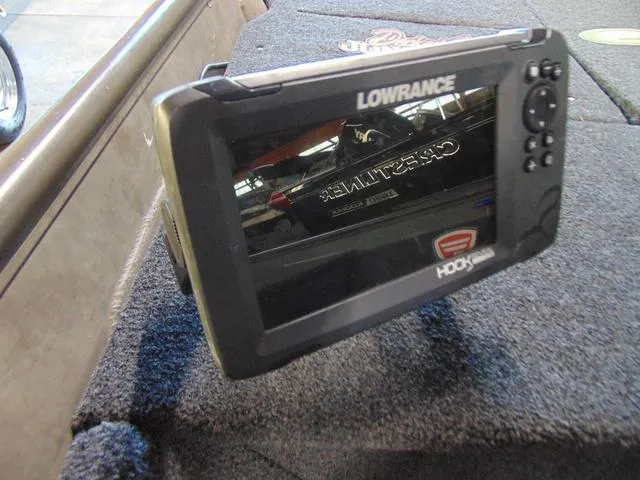 Slide: The Image of Lowrance Hook fish finder on 2016 WeldBilt 1647 boat, carpeted surface. - 6