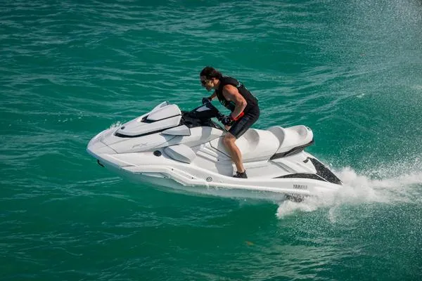 Slide: The Image of 2025 Yamaha Waverunner FX Cruiser SVHO with Audio on turquoise water. - 11