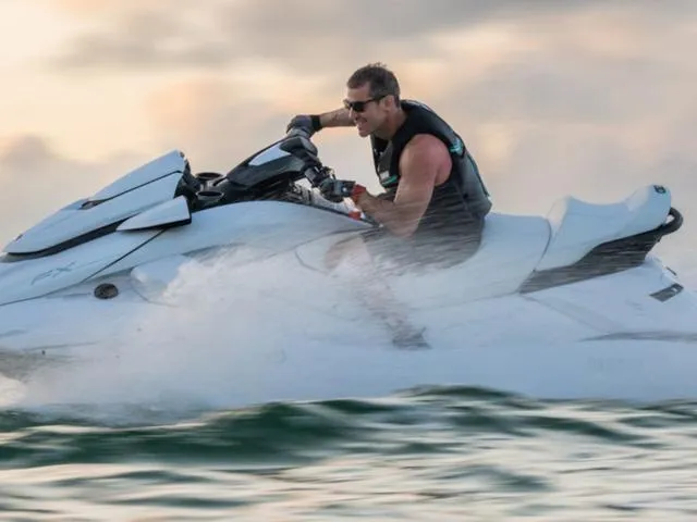 Slide: The Image of Man riding 2025 Yamaha Waverunner FX Cruiser SVHO on water, creating splashes. - 9