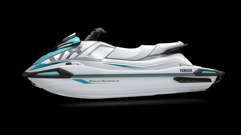 Slide: The Image of 2025 Yamaha Waverunner VX Deluxe, sleek white and teal design, side view on black background. - 3