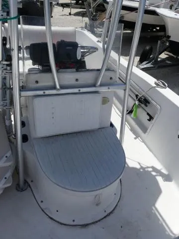 Slide: The Image of 2009 Angler 180 CC boat interior with seating and console. - 12