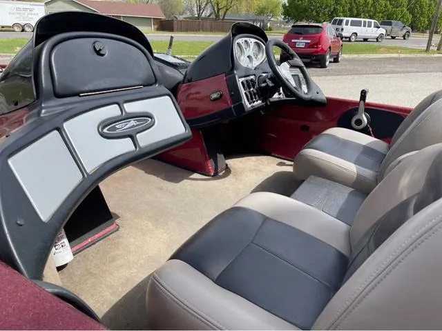 Slide: The Image of 2008 Skeeter ZX190 boat interior with steering wheel and seating. - 8