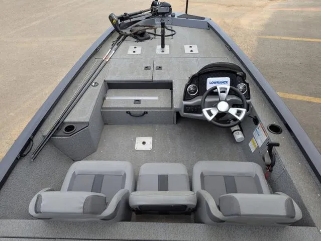 Slide: The Image of 2022 G3 Sportsman 1710 boat interior with steering console and seating. - 23