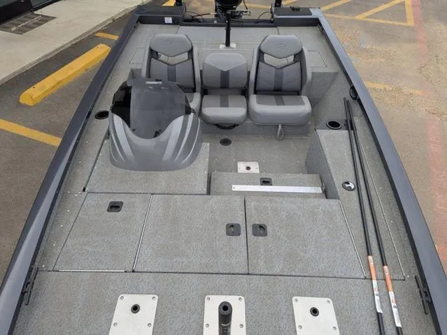 Slide: The Image of 2022 G3 Sportsman 1710 boat interior with gray seating and fishing rod holders. - 24