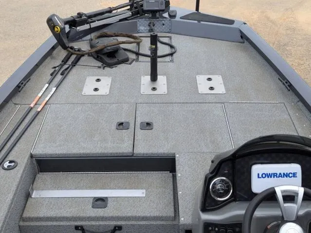 Slide: The Image of 2022 G3 Sportsman 1710 boat interior with fishing gear and Lowrance electronics. - 25