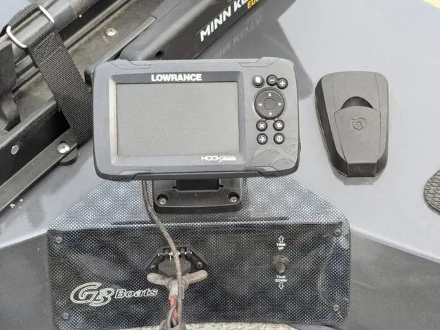 Slide: The Image of Fishfinder and controls on 2022 G3 Sportsman 1710 boat dashboard. - 29