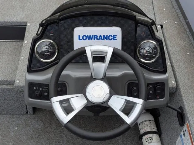 Slide: The Image of Steering console of 2022 G3 Sportsman 1710 with Lowrance electronics. - 35