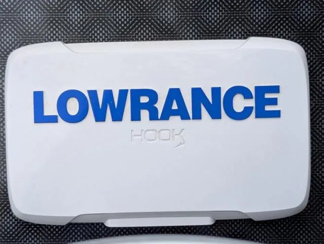 Slide: The Image of Lowrance Hook cover on G3 Sportsman 1710, 2022 model, against textured background. - 37